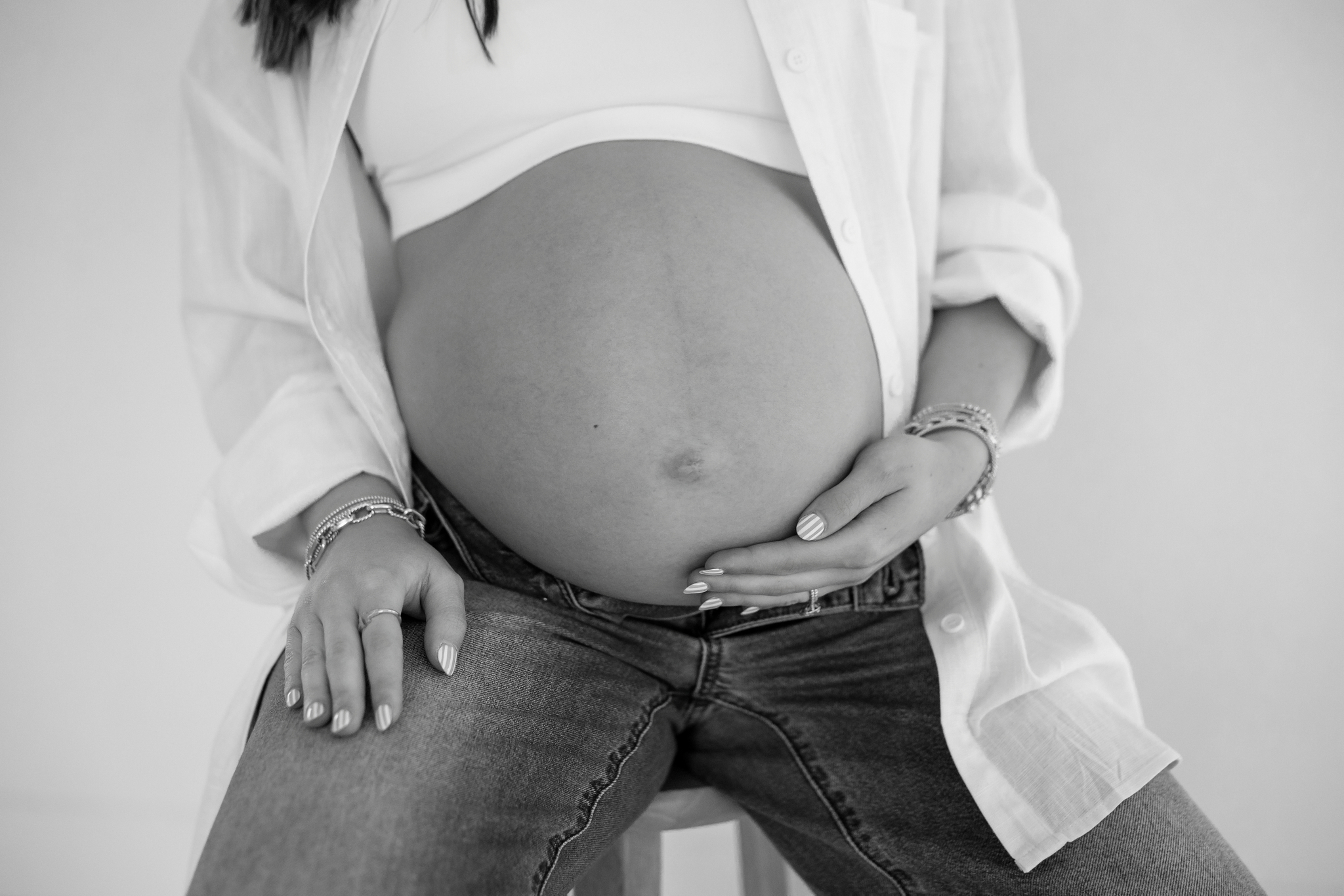 denim and white top maternity in studio black and white