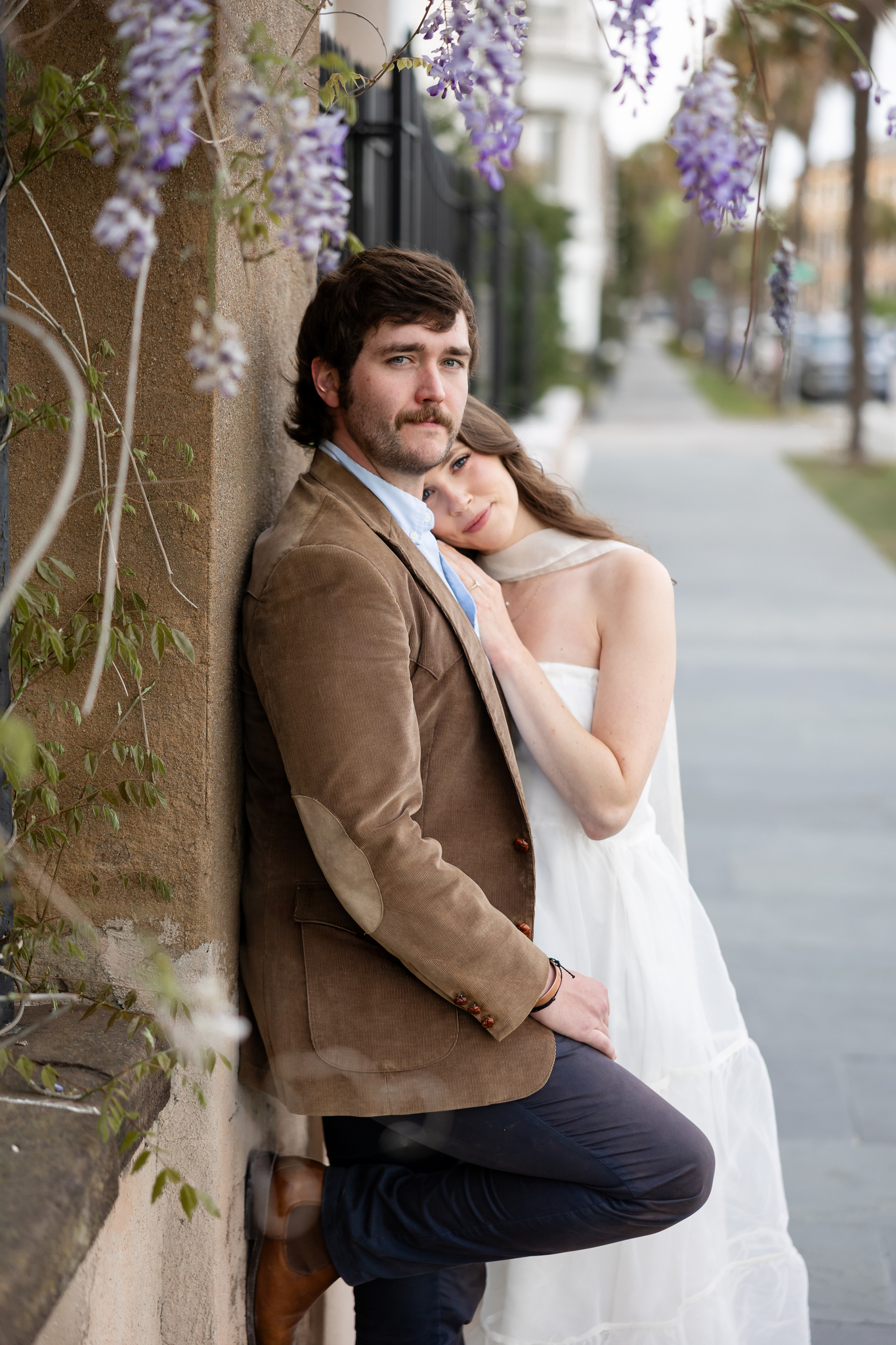 engagement session in charleston on the battery with wisteria