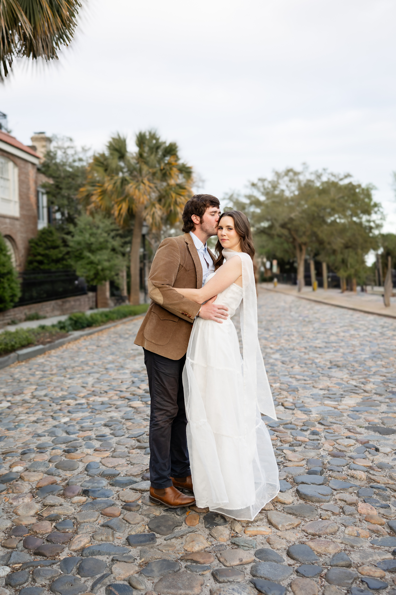 charleston engagement session with cobblestone road